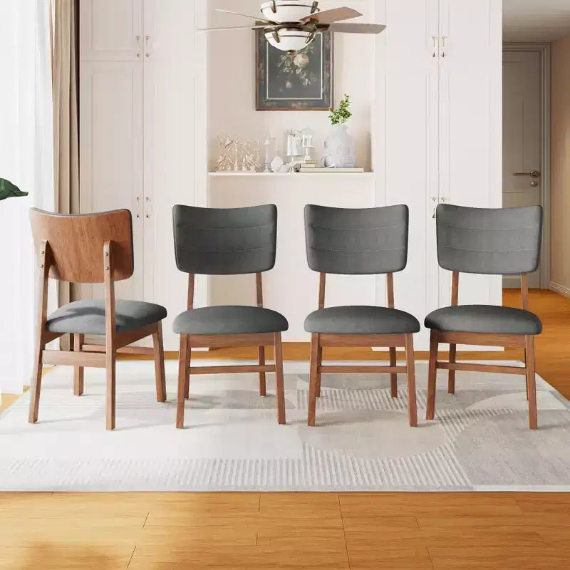 Juego de 4 sillas de comedor tapizadas Peterson de GDFStudio con estructura resistente de madera de caucho