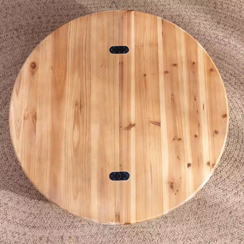 Mesa de centro redonda elevable GDFStudio Ellington con almacenamiento oculto