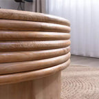 Mesa de centro redonda elevable GDFStudio Ellington con almacenamiento oculto