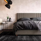 Cama de plataforma tapizada Wynn con cabecero capitoné